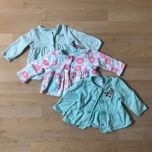Three infant jackets, one is reversible